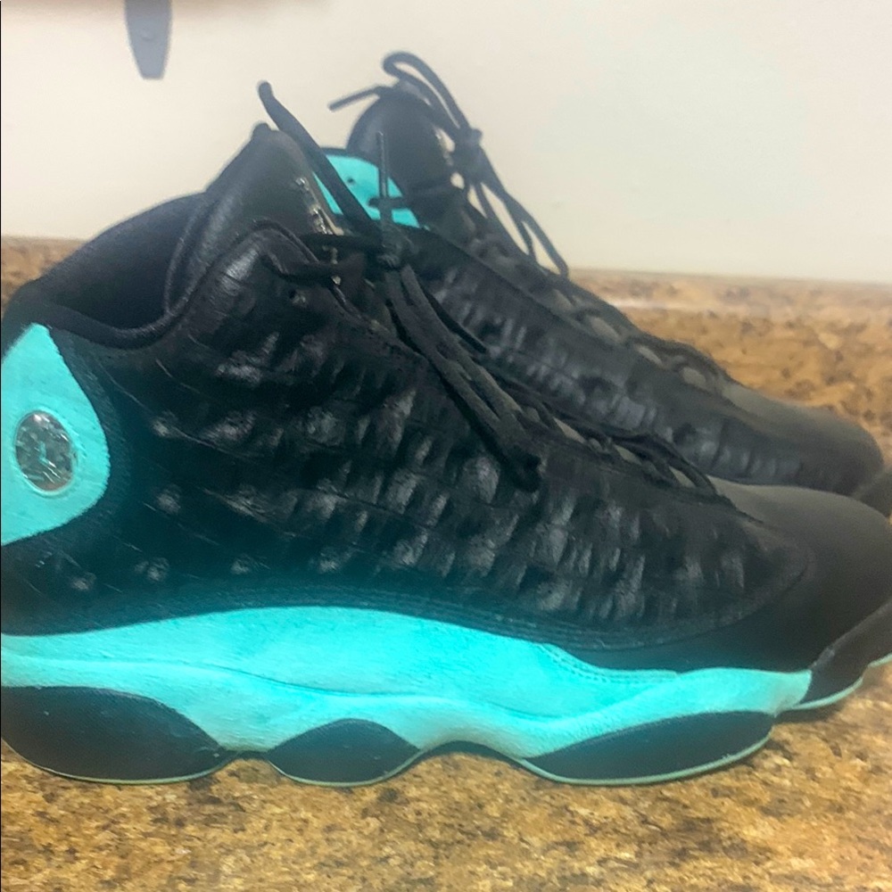 Men’s Jordan 13 retro black and Tiffany blue shoes. Size 12.